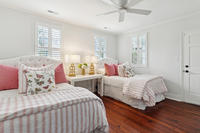 bedroom with multiple windows, ceiling fan, and dark hardwood / wood-style flooring