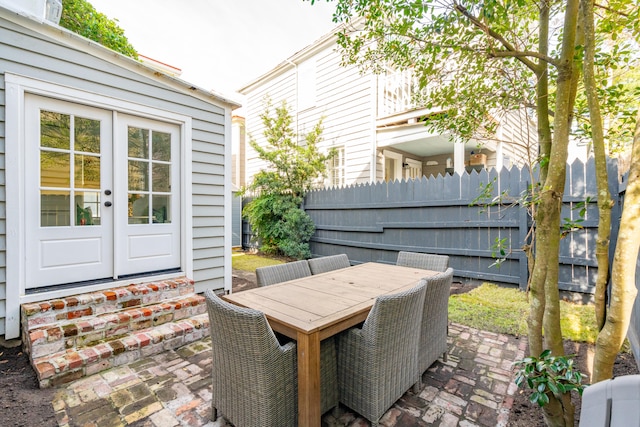 view of patio featuring french doors