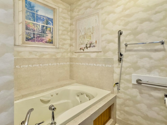 bathroom with a relaxing tiled tub