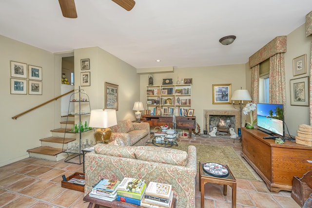 tiled living room with ceiling fan