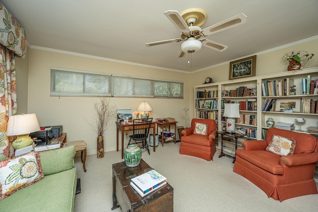 carpeted living room featuring ceiling fan and ornamental molding