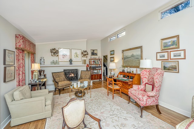 living room featuring hardwood / wood-style flooring and vaulted ceiling