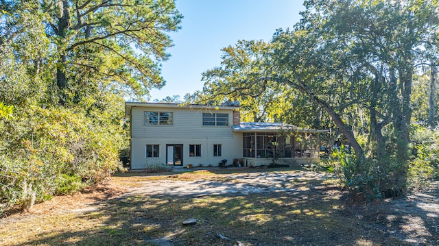 view of front facade featuring a sunroom