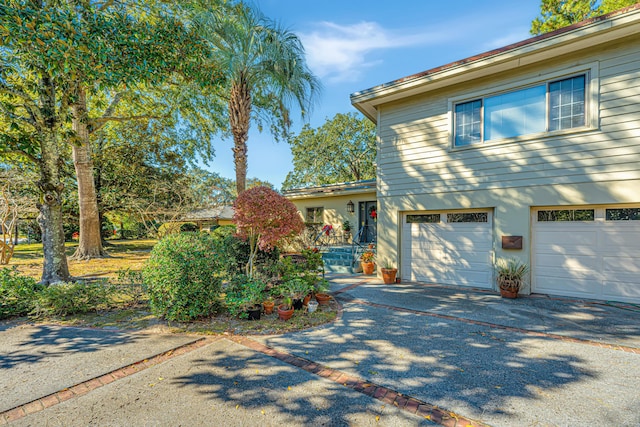 view of front of home featuring a garage