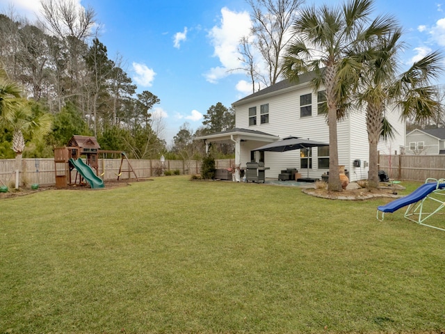 view of yard featuring a playground