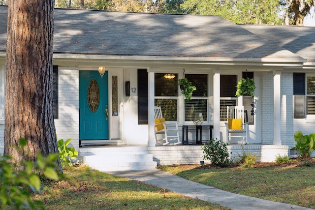 property entrance with a porch