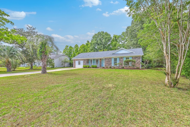2534 Flamingo Dr, Charleston, SC 29414 - ranch-style house with driveway, a front yard, and brick siding