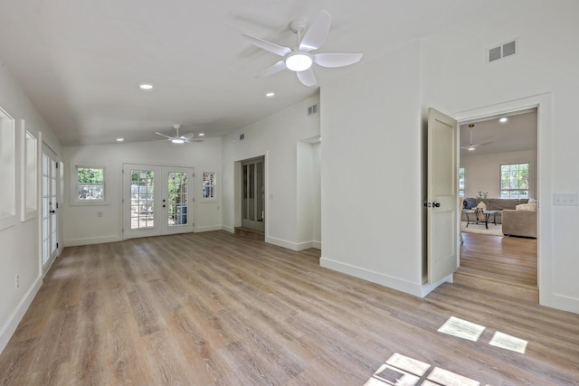 2534 Flamingo Dr, Charleston, SC 29414 - unfurnished living room with ceiling fan, light wood-type flooring, french doors, recessed lighting, and lofted ceiling
