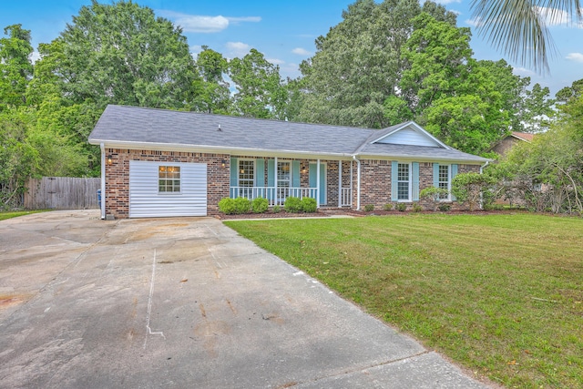 2534 Flamingo Dr, Charleston, SC 29414 - ranch-style home with covered porch, brick siding, and driveway