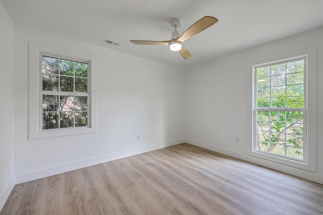 2534 Flamingo Dr, Charleston, SC 29414 - spare room featuring healthy amount of natural light, wood finished floors, ceiling fan, and baseboards