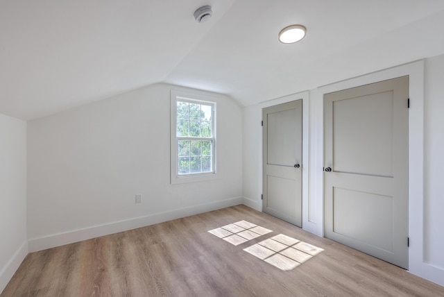 2534 Flamingo Dr, Charleston, SC 29414 - additional living space with light wood finished floors, vaulted ceiling, and baseboards