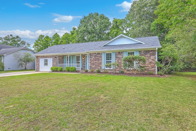 2534 Flamingo Dr, Charleston, SC 29414 - ranch-style home with brick siding, a front yard, and covered porch