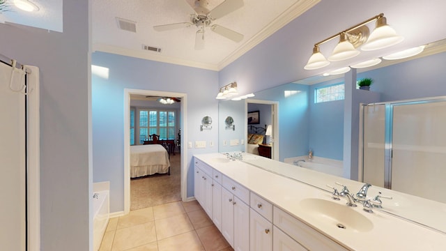 bathroom featuring ensuite bath, a ceiling fan, a garden tub, ornamental molding, and double vanity