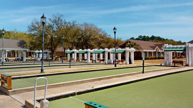 view of home's community featuring a bocce ball area