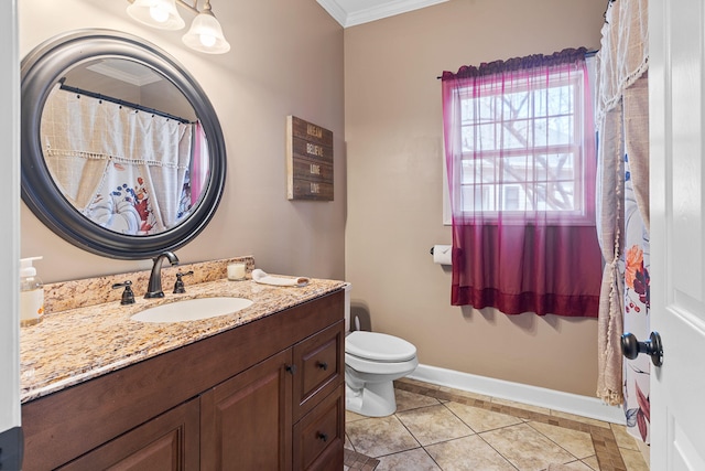 bathroom with tile patterned flooring, toilet, vanity, baseboards, and ornamental molding