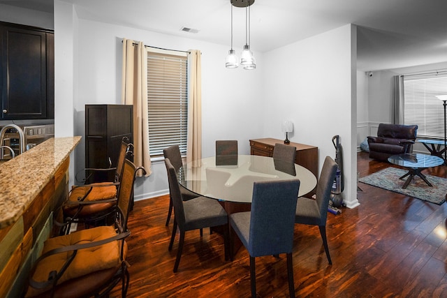 dining room featuring dark hardwood / wood-style floors