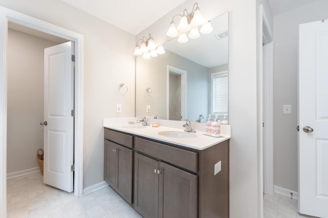 297 Red Leaf Blvd, Moncks Corner, SC 29461 - full bathroom featuring double vanity and baseboards