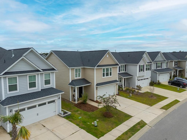 297 Red Leaf Blvd, Moncks Corner, SC 29461 - view of front of home with an attached garage, driveway, a residential view, roof with shingles, and a front yard