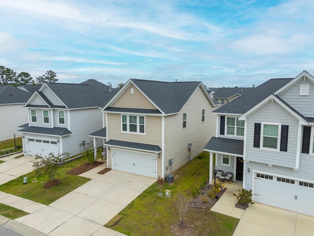 297 Red Leaf Blvd, Moncks Corner, SC 29461 - traditional-style house featuring an attached garage, concrete driveway, roof with shingles, a residential view, and a porch