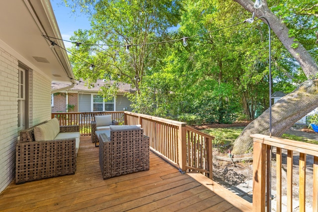deck with an outdoor living space