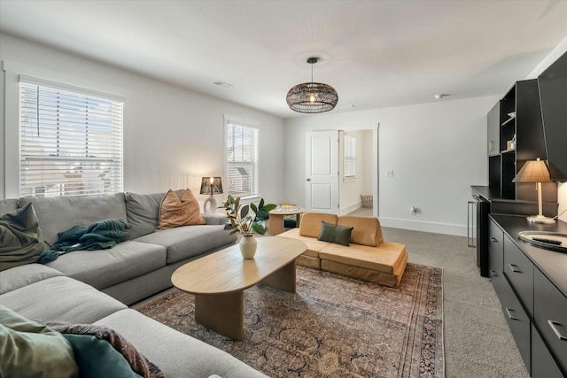 living room featuring light carpet