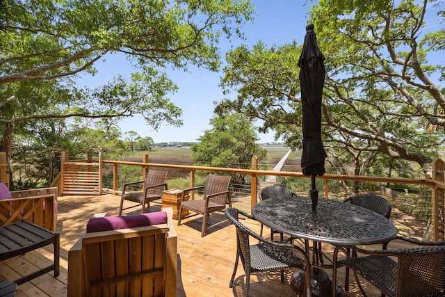 wooden terrace featuring an outdoor living space