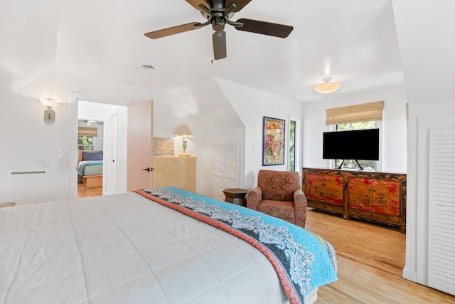 bedroom with wood-type flooring and ceiling fan