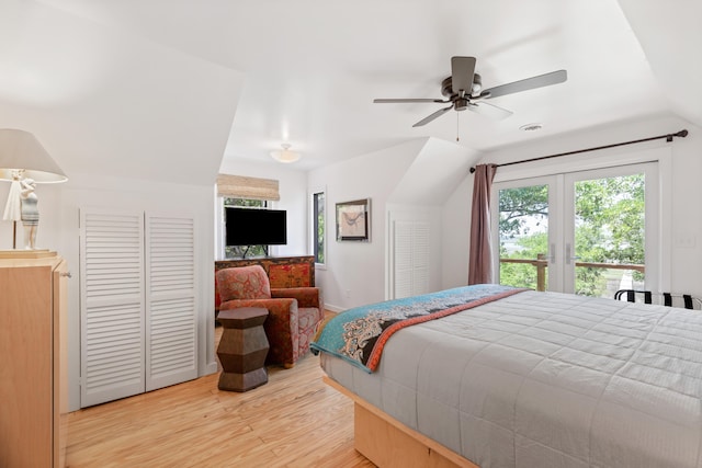 bedroom with wood-type flooring, lofted ceiling, access to outside, and ceiling fan