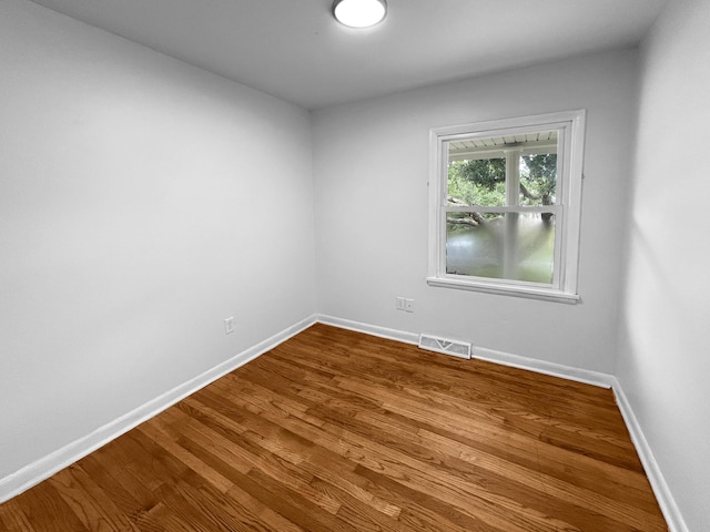 1481 Woodview Ln, Charleston, SC 29412 - empty room with dark wood-style floors