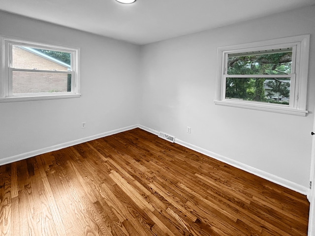 1481 Woodview Ln, Charleston, SC 29412 - spare room featuring plenty of natural light and dark wood-style floors