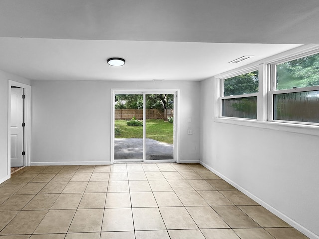 1481 Woodview Ln, Charleston, SC 29412 - spare room featuring plenty of natural light and light tile patterned floors