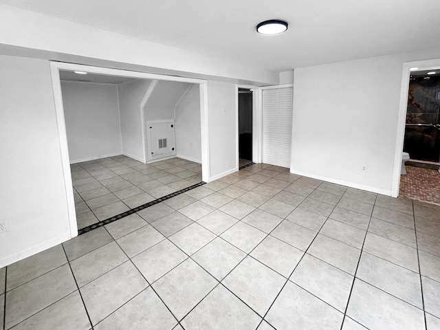 1481 Woodview Ln, Charleston, SC 29412 - finished basement featuring light tile patterned floors and baseboards