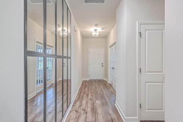 hall featuring light wood-type flooring