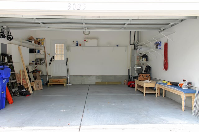 garage featuring water heater