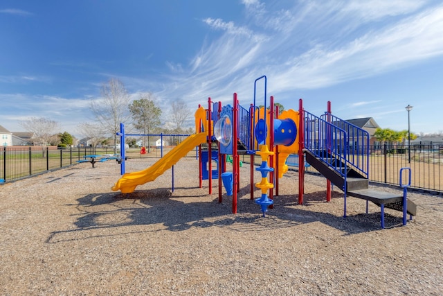 community playground featuring fence