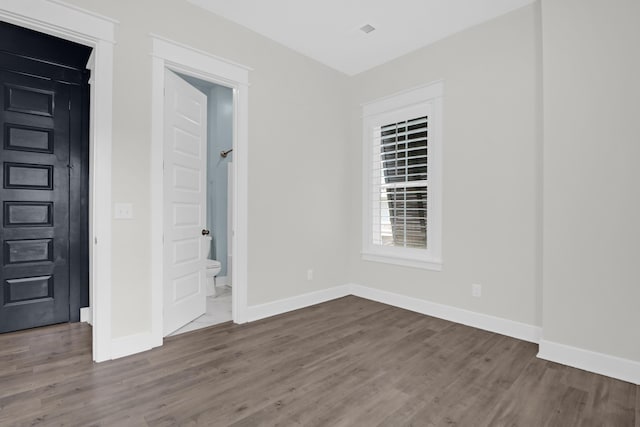 779 Forrest Dr, Charleston, SC 29492 - empty room with wood finished floors and baseboards