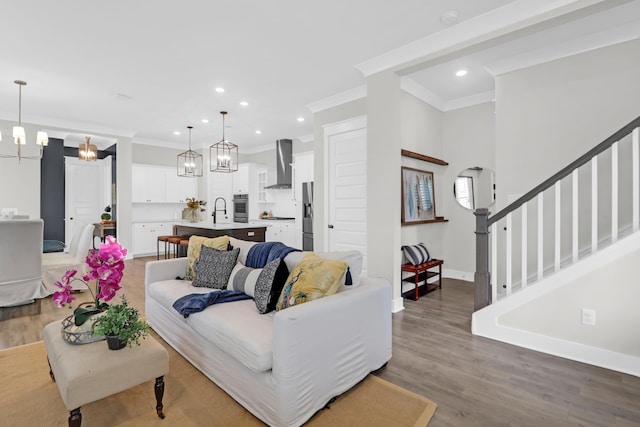 779 Forrest Dr, Charleston, SC 29492 - living room with ornamental molding, wood finished floors, stairway, recessed lighting, and baseboards