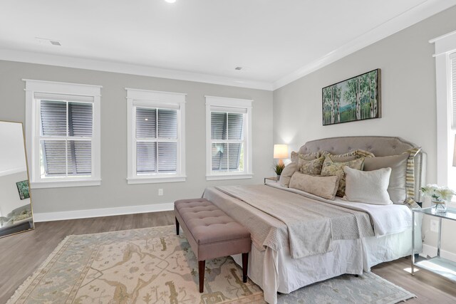 779 Forrest Dr, Charleston, SC 29492 - bedroom with wood finished floors, crown molding, and baseboards
