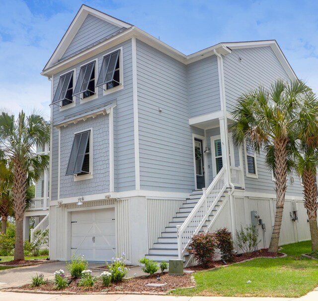 779 Forrest Dr, Charleston, SC 29492 - coastal inspired home with stairs, a garage, and driveway