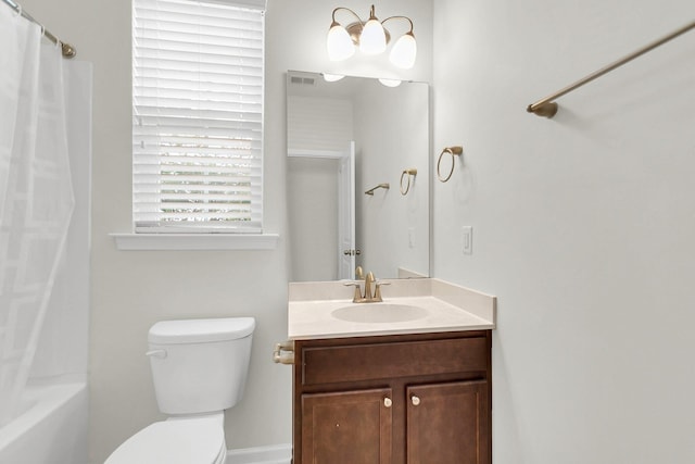 bathroom featuring toilet, visible vents, shower / bath combination with curtain, and vanity