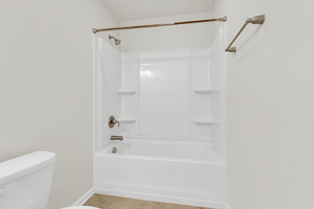 full bathroom featuring baseboards, toilet, and tile patterned floors