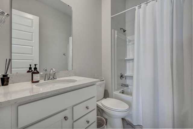 bathroom featuring shower / tub combo, toilet, and vanity