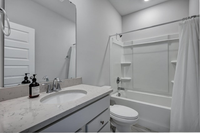 full bathroom with shower / bath combo with shower curtain, toilet, and vanity