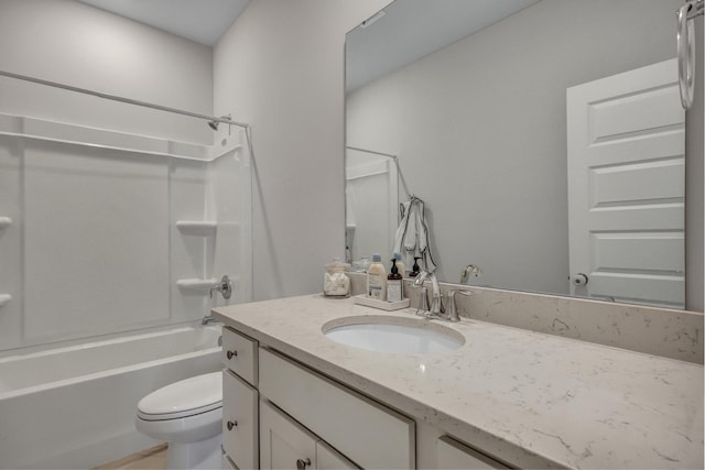 full bath with vanity, shower / bathing tub combination, and toilet