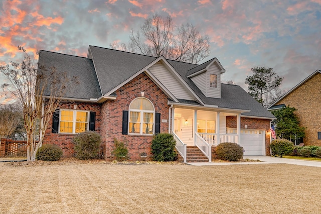 view of front of house with a front yard, crawl space, brick siding, and driveway