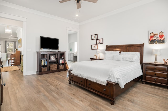 bedroom featuring baseboards, ceiling fan, crown molding, light wood-type flooring, and connected bathroom