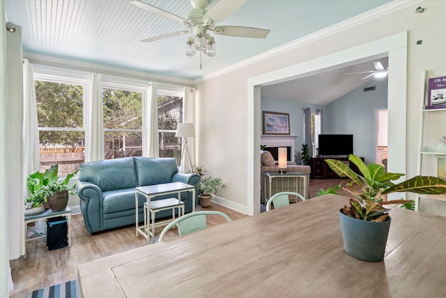 1227 Ocean View Rd, Charleston, SC 29412 - dining area with a ceiling fan, wood finished floors, vaulted ceiling, baseboards, and crown molding
