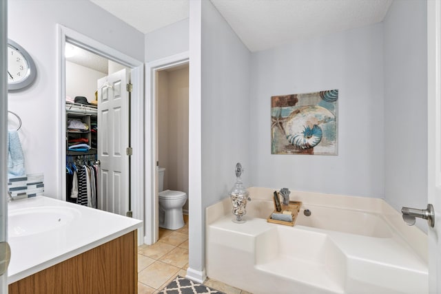 1227 Ocean View Rd, Charleston, SC 29412 - bathroom with a bath, tile patterned flooring, toilet, a textured ceiling, and vanity