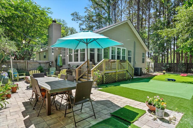 1227 Ocean View Rd, Charleston, SC 29412 - fenced backyard with a putting area, a patio area, outdoor dining space, and cooling unit