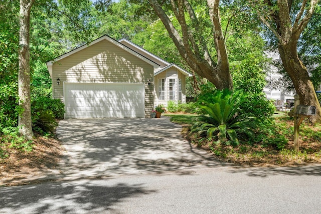 1227 Ocean View Rd, Charleston, SC 29412 - view of front of property with asphalt driveway and an attached garage